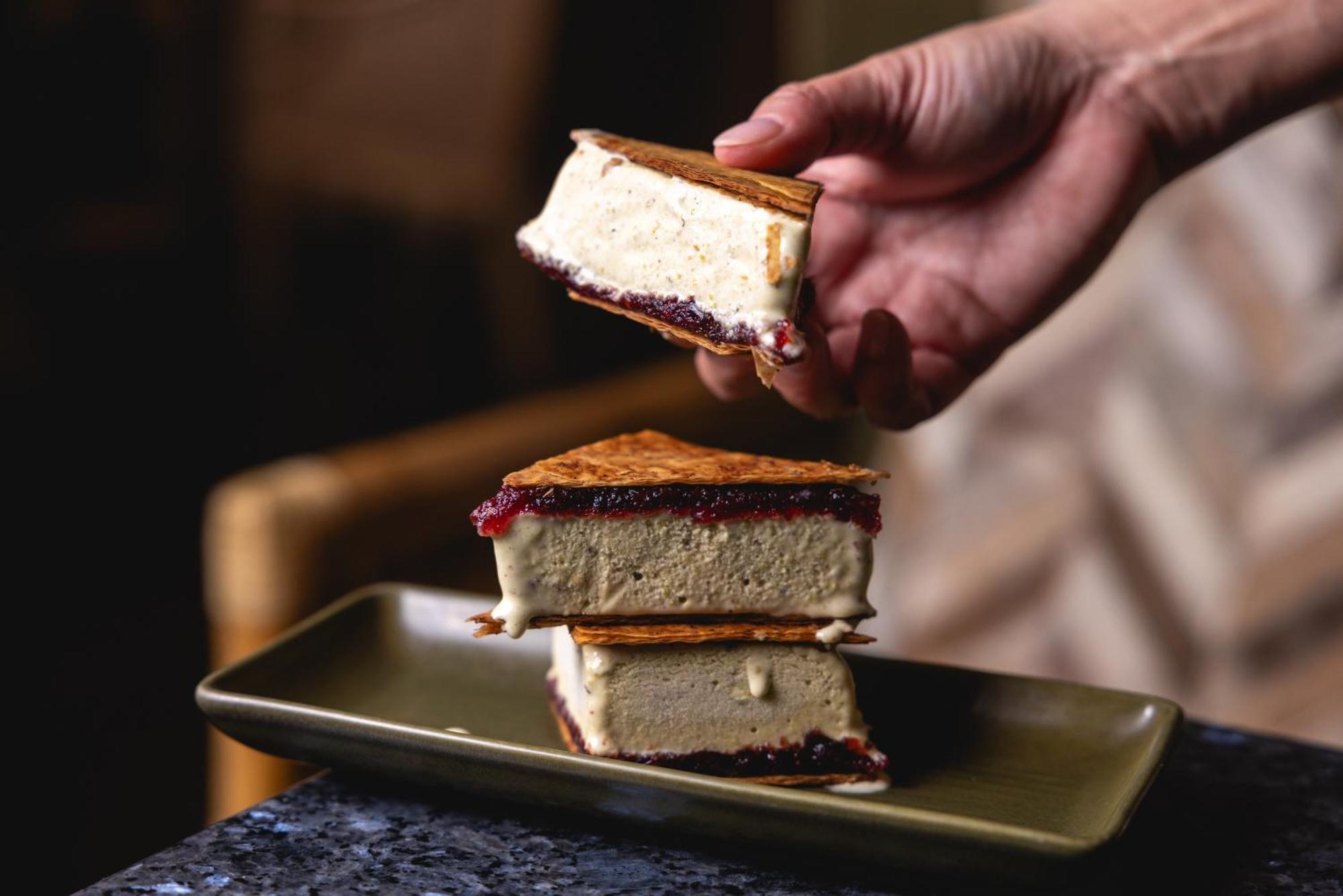 Ovolo The Valley Brisbane Esterno foto A hand holding a piece of ice cream sandwich